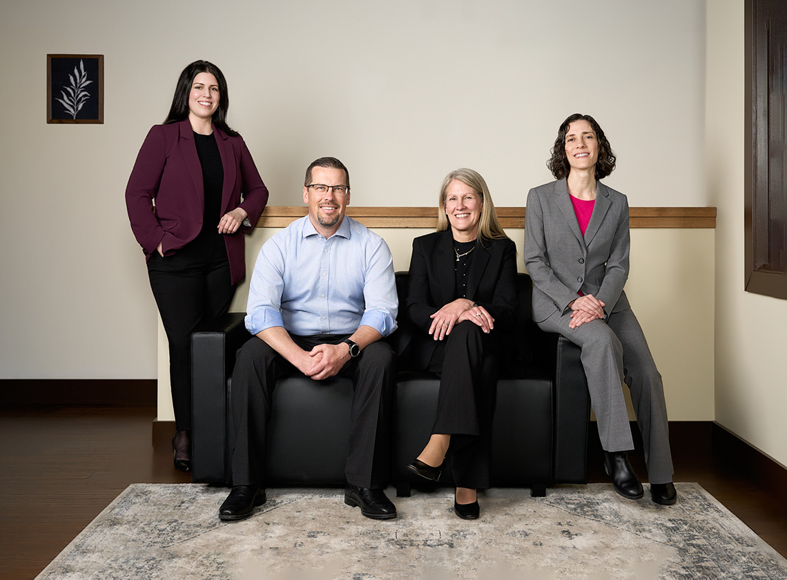 The L. Johnson Law Group legal team of four at the firm's Cloverdale office in Surrey, BC.